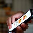 Person ordering food on a mobile phone