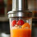 Hands blending a smoothie